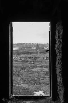 A door is open to a field Stock Photos
