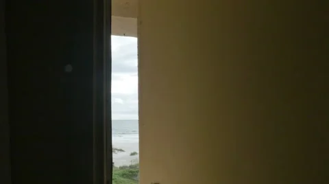 Door Opened to Beach with Waves Crashing in St Augustine Beach Florida, 4K Stock Footage 55546923