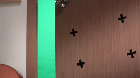 Door is opening and camera track in to the green screen background. Stock Footage 54189972