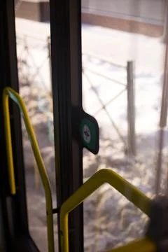 Door opening button on bus Photos