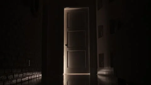 Door opening ominously in the dark Stock Footage 259851215