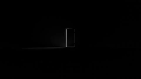 Door opens and a bright light flooding a dark room. Can be used as a concept of  Stock Footage 165381632