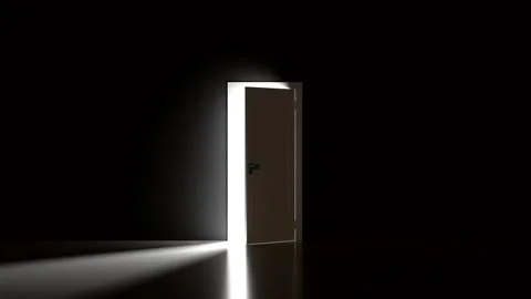 The door opens onto a bright room with glaring white light. Video stock 325974324
