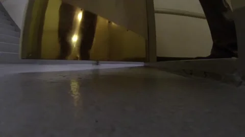 Door opens man shoe steps past camera Stock Footage 47469657