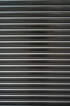 Door or metallic window security closeup Stock Photos