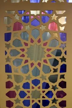 Door with oriental geometric pattern with multicolored stained glass Stock Photos