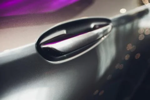 Door panel with unlock handle, design, infrared button, luxury car. Photos