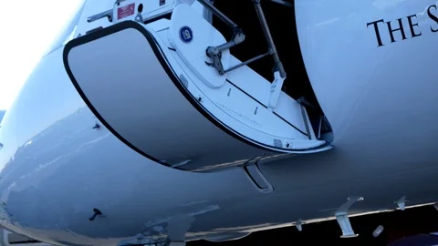 The door of a private jet opens and reve... | Stock Video | Pond5