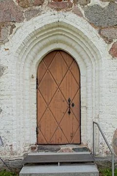 Door on stone wall. Stock Photos
