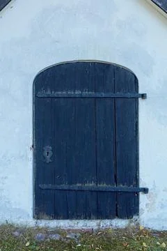 Door on stone wall. Stock Photos