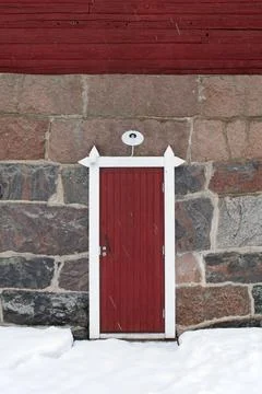 Door on stone wall. Stock Photos