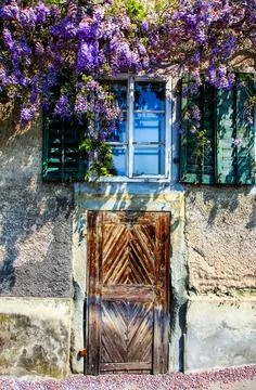 A door with a window in front of it Stock Photos