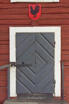 Door on wood wall. Stock Photos