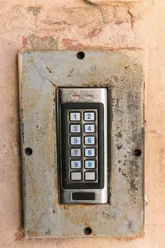 Doorbell button panel and intercom. Stock Photos