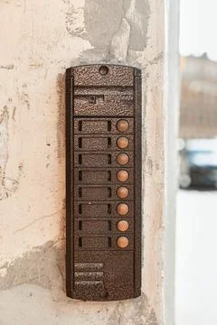 Doorbell button panel and intercom. Stock Photos