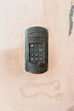 Doorbell button panel and intercom. Stock Photos