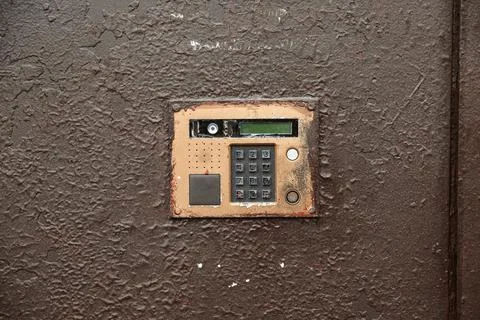 Doorbell button panel and intercom. Stock Photos