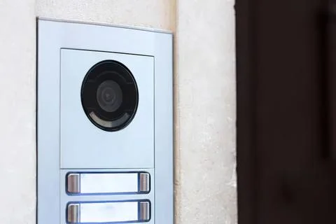 Doorbell with camera and intercom system on wall Stock Photos