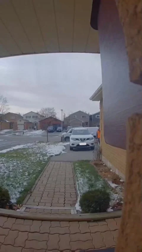 Doorbell Camera Catches Delivery Driver Throwing Package, Canada - 09 Mar 2023 Stock Footage 235383510