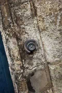 Doorbell on a facade Stock Photos