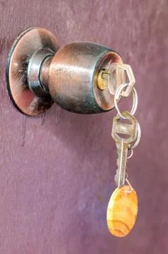 Doorknob with key Stock Photos