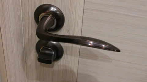 Doorknob turns Stock Footage 46004166