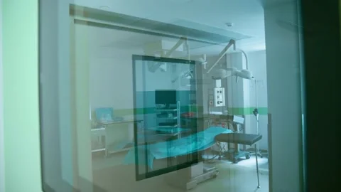 Doors to an empty operating room with medical equipment for surgery. Stock Footage 221273110