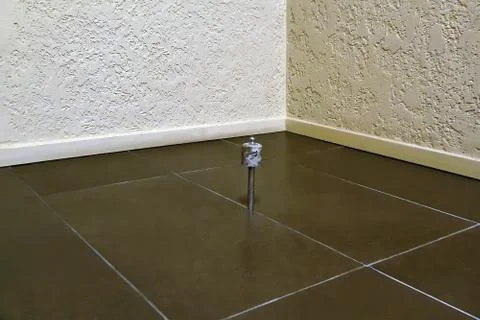 Doorstop in the corner. Stock Photos