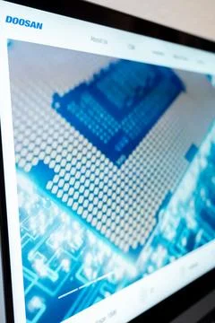 Doosan website displaying computer chip te.. Stock Photos