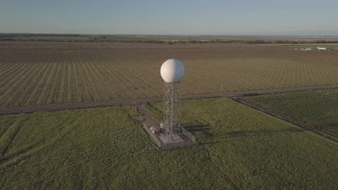 Doppler weather radar antenna on tower near Davis CA Stock Footage