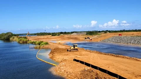 DORADO, PUERTO RICO -Digger Working Building a Dam for Flood Control Stock Footage 237823072