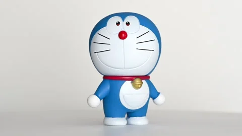 Doraemon action figure rotating on display Stock Footage 333199779