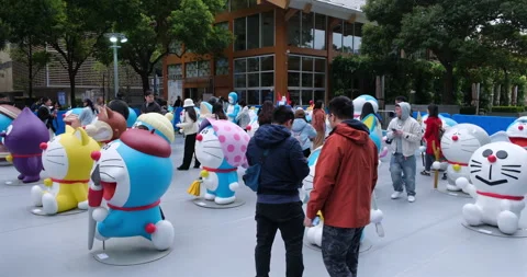 Doraemon exhibition with people Stock Footage 305320770