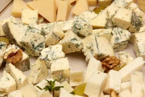 Dorblu cheese with nuts and mint close-up. Stock Photos