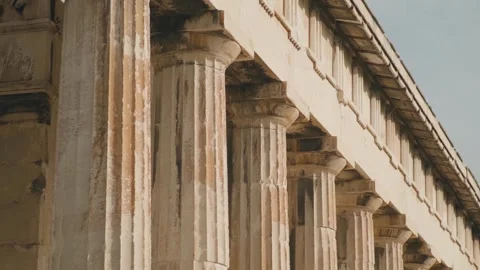 Doric marble columns in collonade of Temple of Hephaestus in Ancient Agora Stock Footage 261448794
