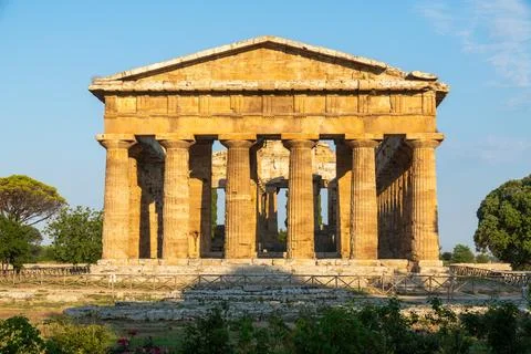 Doric temple facade with stone columns in Paestum Stock Photos