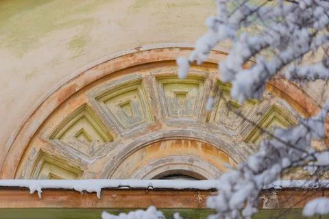 Dormer window with bas-relief Stock Photos