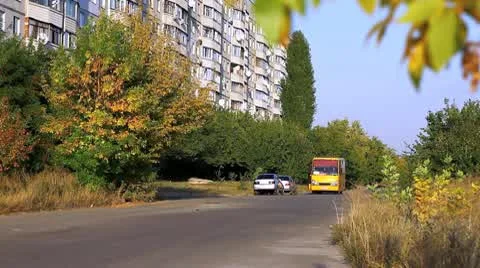 Dormitory and yellow bus Stock Footage 10559466