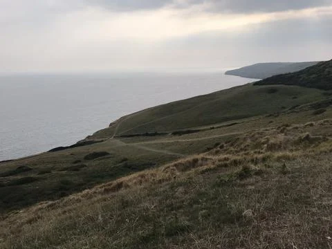Dorset Cliffs looking out over the sea Stock Photos
