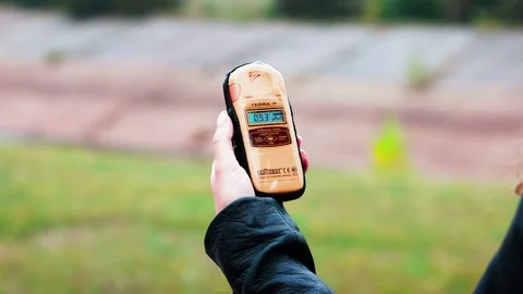 Dosimeter In Hand Showing High Level Of Radiation in Chernobyl, Ukraine Stock Footage 171598064