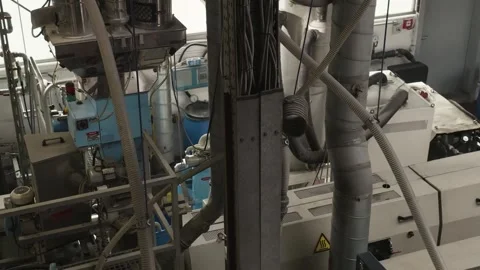 Dosing Unit Feeding Plastic Extrusion Machine, Factory Interior, Close Up Shot Stock Footage 341299764