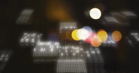Dot grids shifting causing bokeh lights flashing while binary digits scrolling Stock Footage 310418718