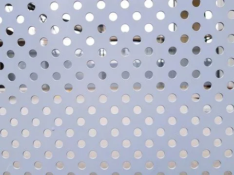 Dot or point seamless pattern on gray or grey stainless steel background. Stock Photos