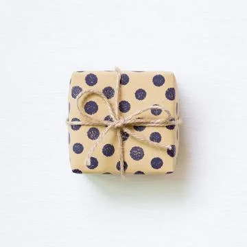 Dot pattern brown gift box isolated on white background Dot pattern brown ... Stock Photos