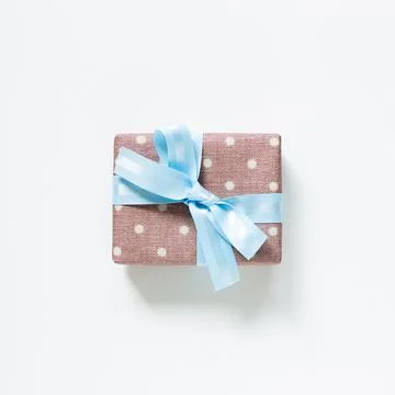 Dot pattern pink gift box isolated on white background Stock Photos