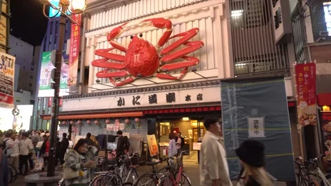 Dotonbori Entertainment District On Weekend - Large Red Crab at Kani Doraku Stock Footage 268744276