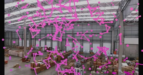 Dots appearing across warehouse, network lines expanding and pulsing while 스톡 동영상 309678338
