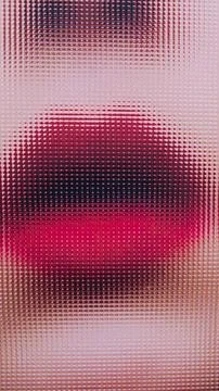 Dots in the shape of a woman's lips painted in bright red colour Stock Photos