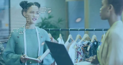 Dotted map overlay shifting, two shop staff consulting, noting sizes, showing Stock Footage 332281173