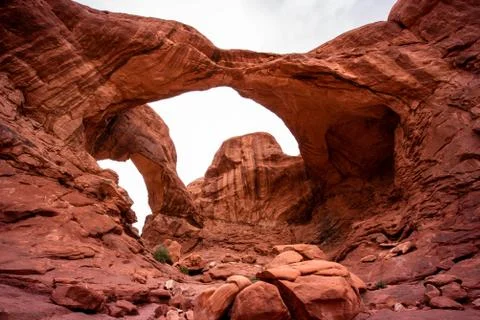 Double arch formation on a cloudy day Stock Photos